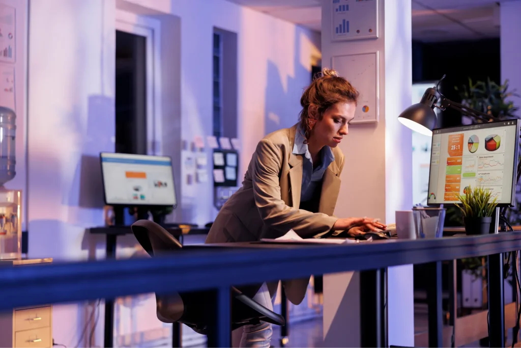 businesswoman analyzing financial growth report computer 1